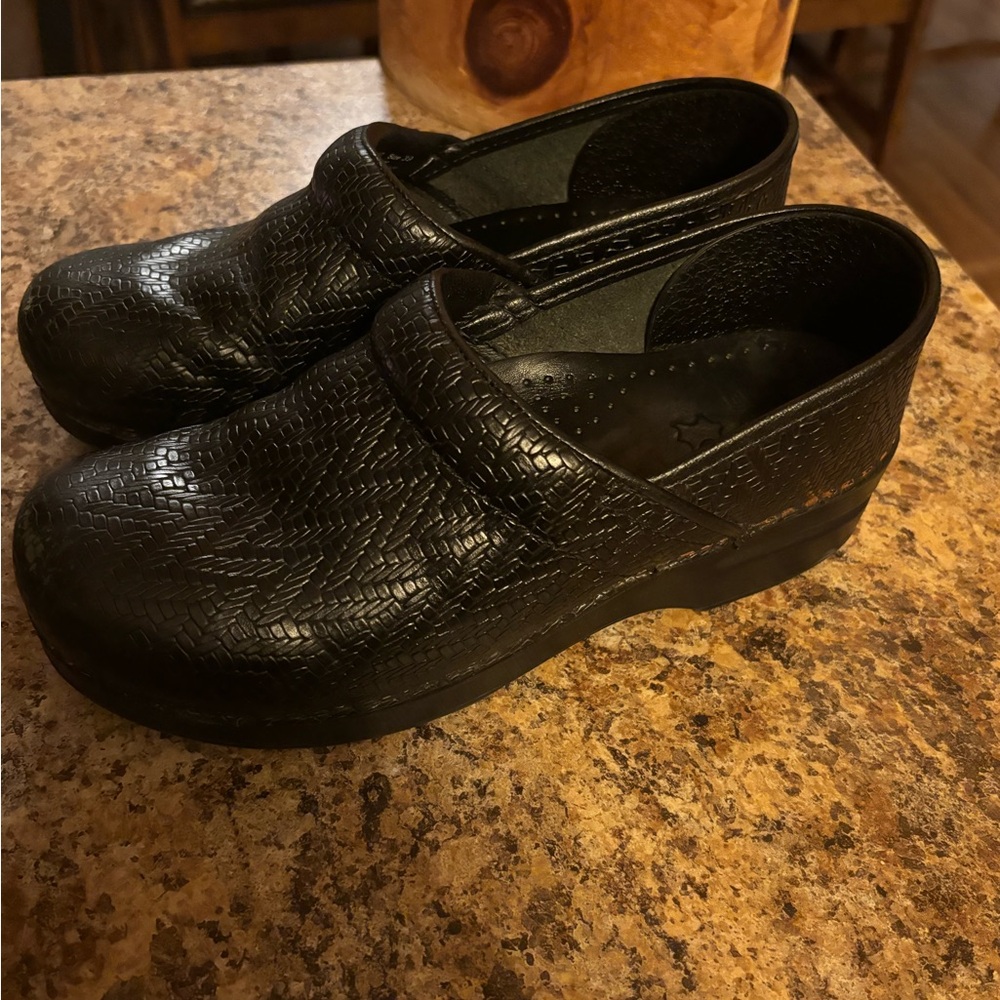 Dansko Black Textured Leather Clogs